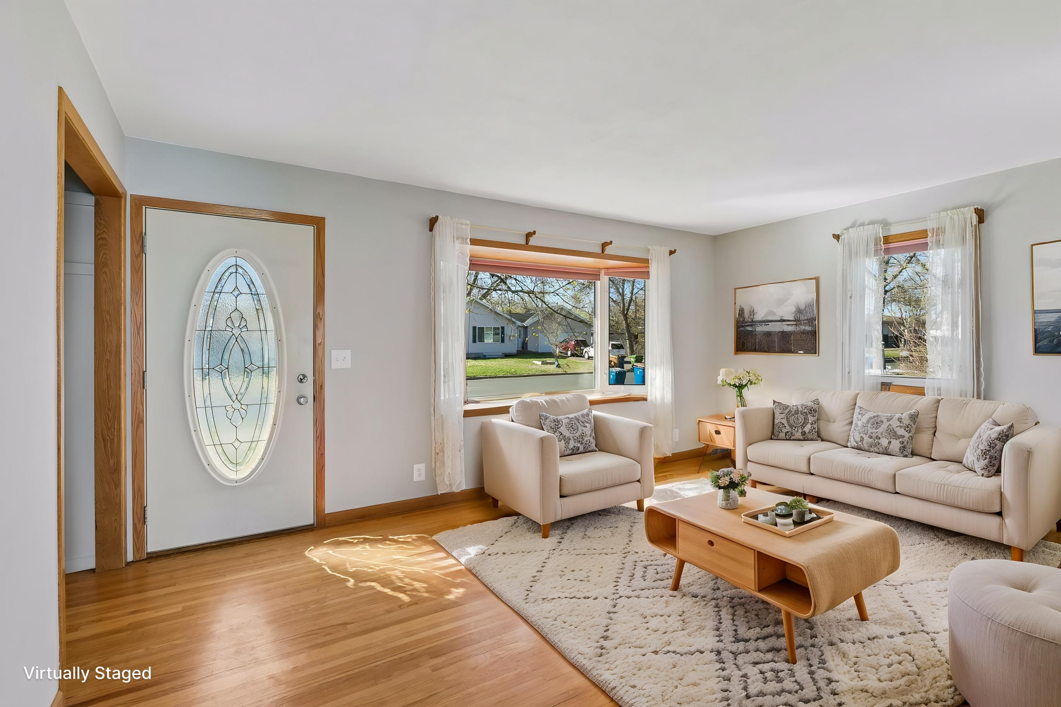 Another virtually staged living room view.