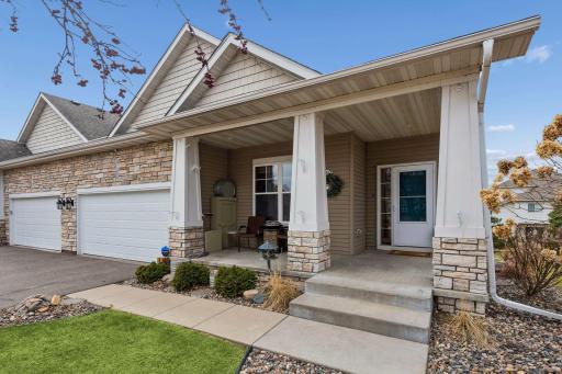 Gorgeous former model home boasts all of the bells and whistles! Inviting covered front porch provides a wonderful first impression and protects your guests from the elements.