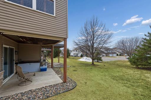 Walk-out level patio with nice access to green space.