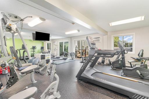 Nice fitness center with an abundance of natural light