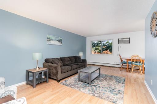 Notice the beautiful trees from your living room offering shade and beauty