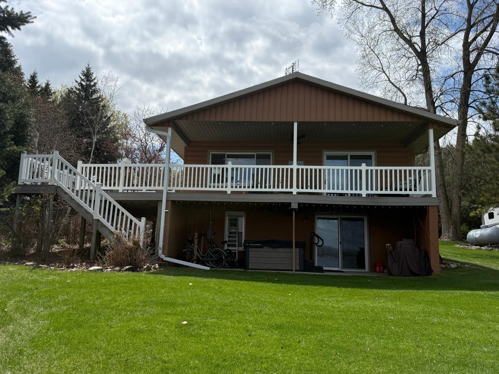 Great views of the lake from both living room areas, the kitchen, dining room, and basement bedroom. Walkout basement to enjoy the hot tub!