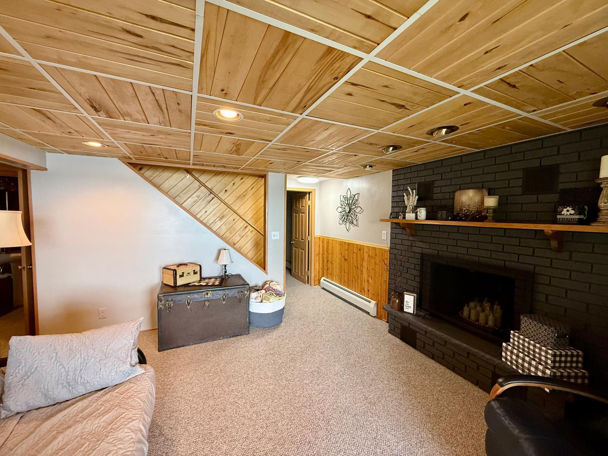The non-egress basement bedroom is to the left when you go down the stairs. It has direct access to the bathroom.