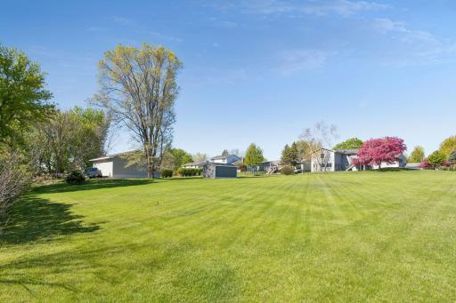 You'll appreciate the storage shed for lawn and garden equipment