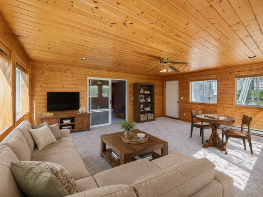 Virtually Staged 4 Season Sun room. Enjoy access to lower-level deck from this room.