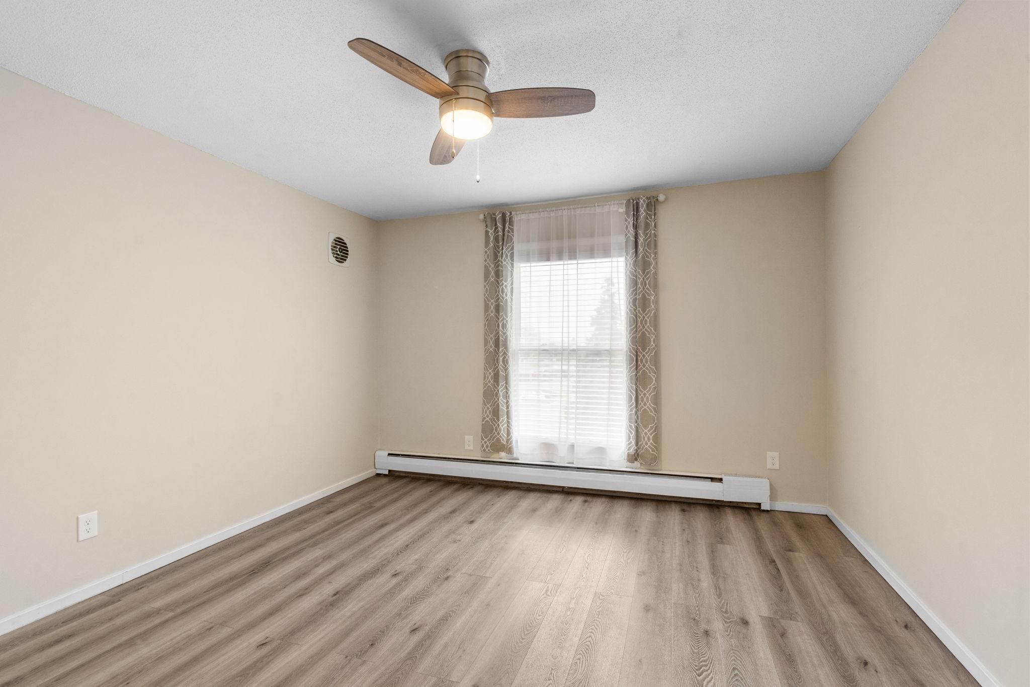 Bedroom is spacious and features LVP floors