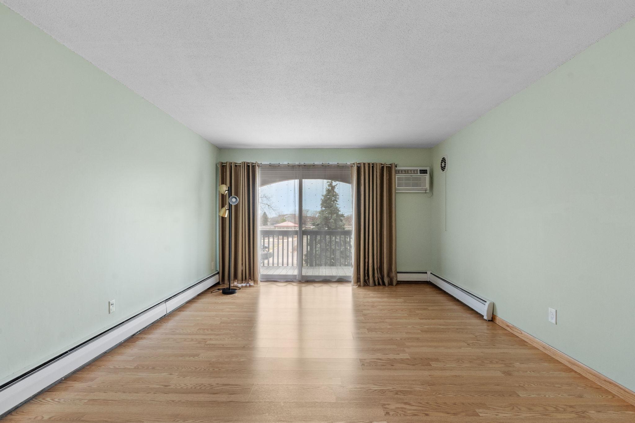Living room walks out to large balcony