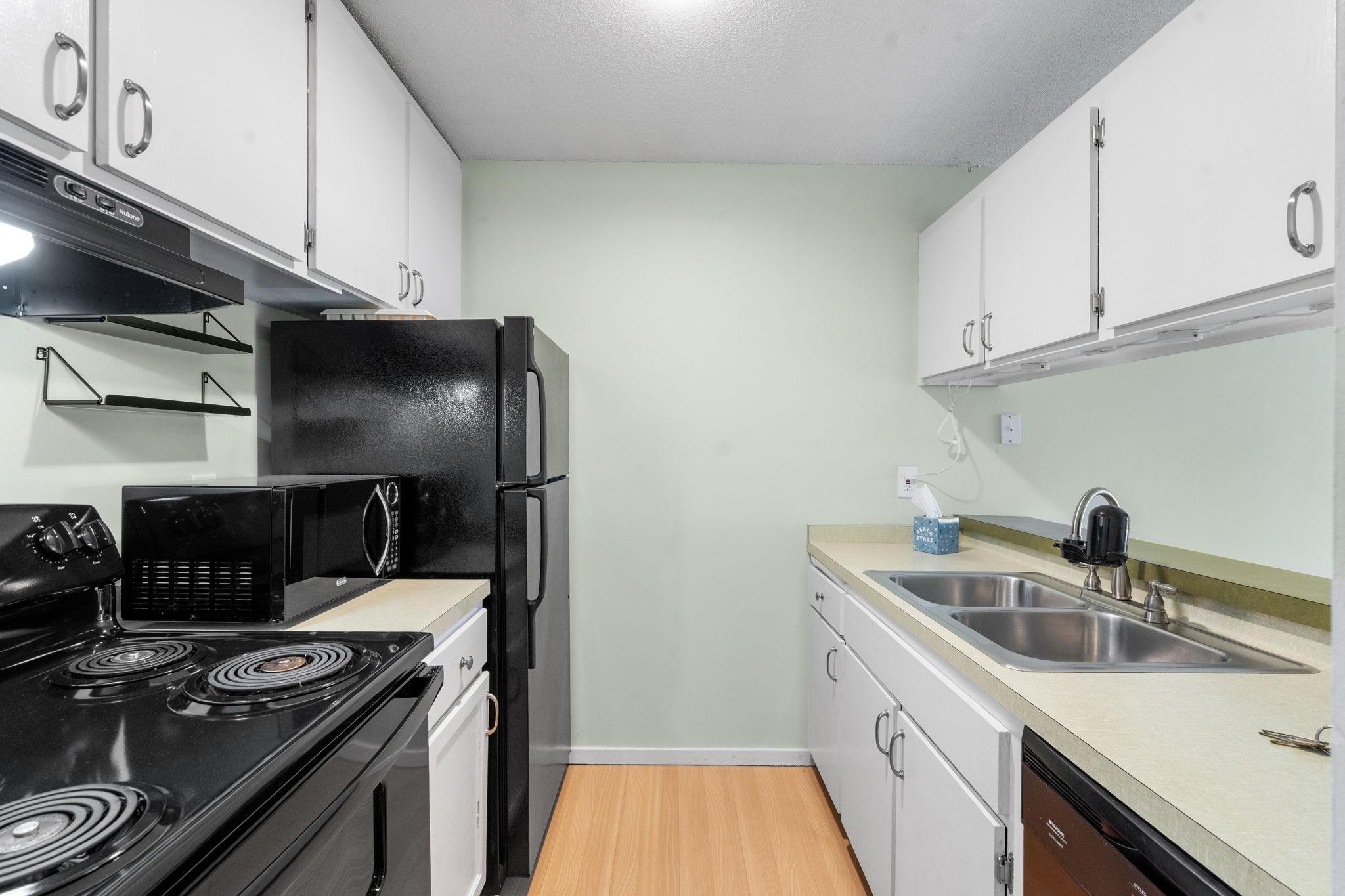 Functional kitchen opens to the living room