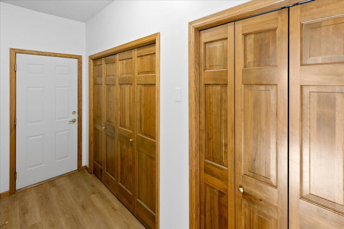 Back entry with utility closet and large coat/storage closet