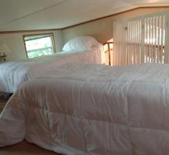 Upstairs loft has ample space for six beds/cots and is a great area to share with family and friends or simply use as storage!