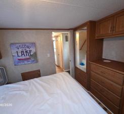 Master bedroom on the main level, just next to the full bathroom and a 2nd entrance.