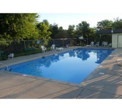 In-ground, heated swimming pool is a great place to hang out.