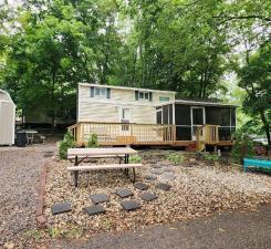 2006 Canterbury Park Model has been nicely updated and has loft and everything you need! No need to search around for a place to camp any longer - you will own it!