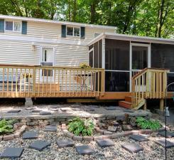 2006 Canterbury Park Model has been nicely updated and has loft and everything you need! No need to search around for a place to camp any longer - you will own it!
