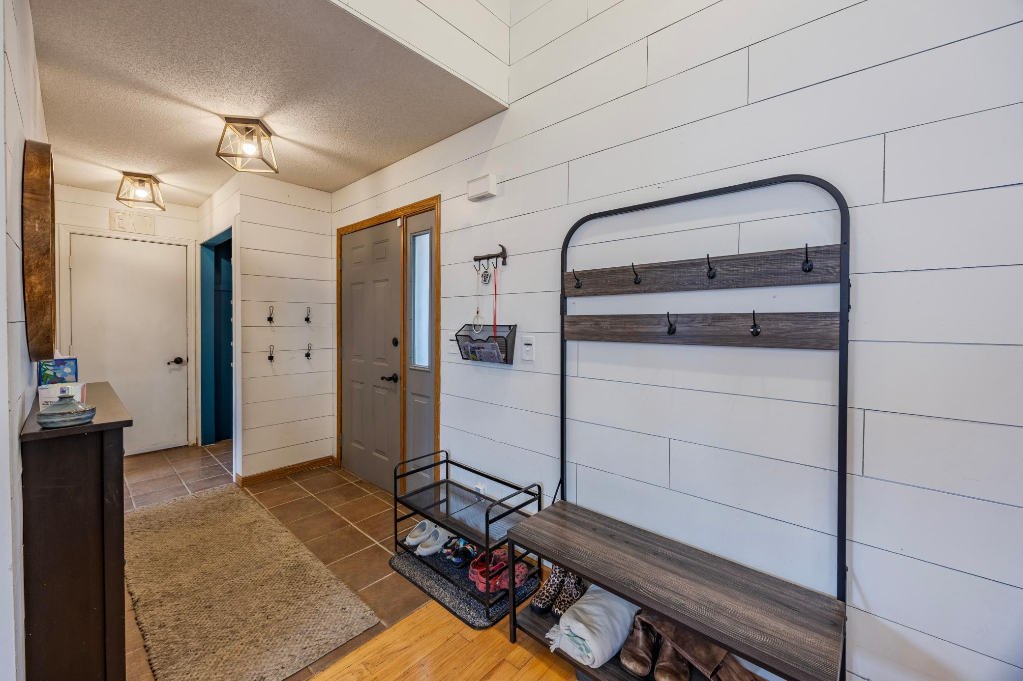 Plenty of space to unload, hang your coats/bags and begin decompression.