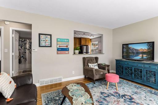 Easy to entertain while in the kitchen with the peak through!