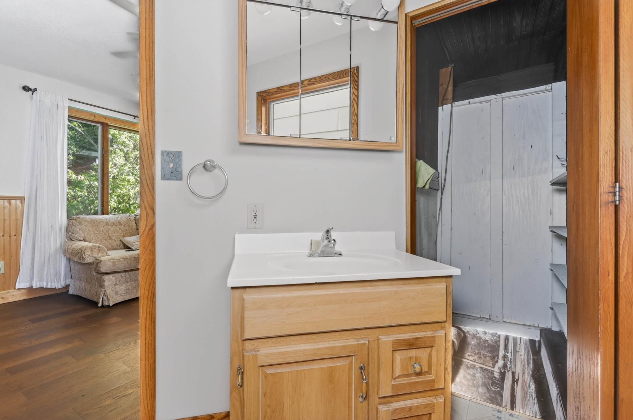Bathroom off the LR-Access to Basement