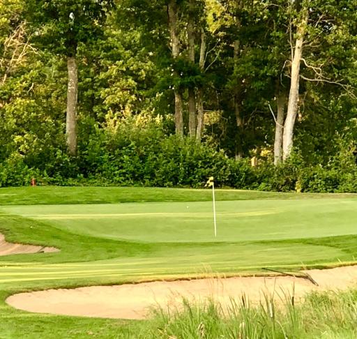 One of the many meticulously kept greens of the Legacy Courses
