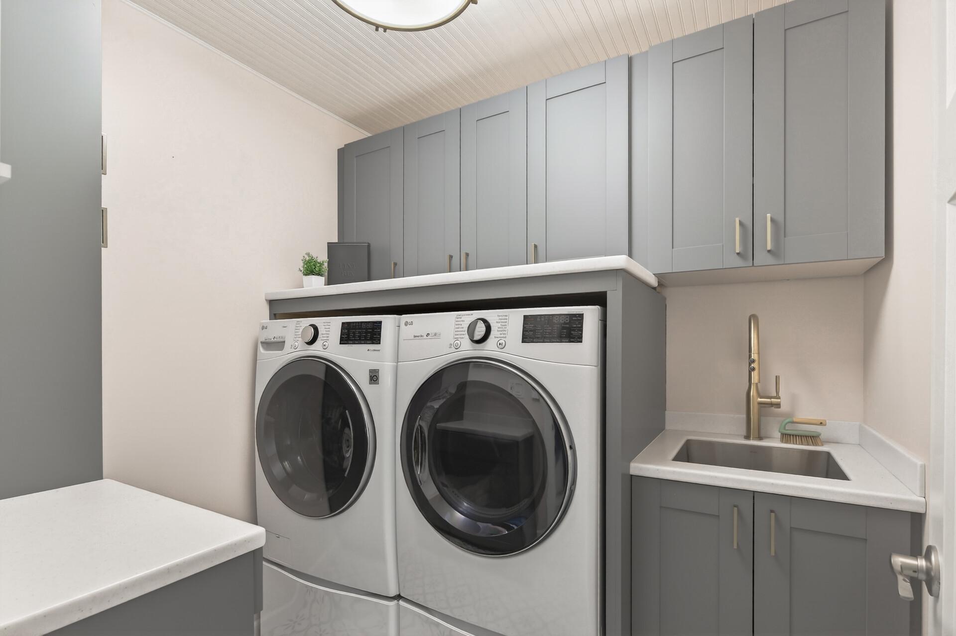 Goodbye Bounty and Hello Bougie! Everybody loves warm clothes from the dryer and now you get to love warm feet from the heated tile in your luxury laundry! High end appliances, custom built-in drying rack, ample storage & more!