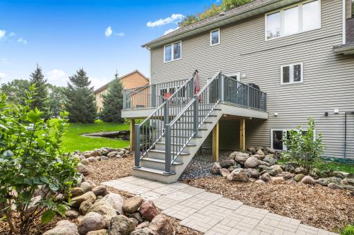 Pavered Walkway and Tasteful Landscape