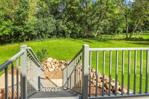 Tree Lined Back Yard Offers Privacy Year Round