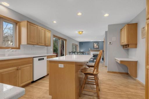 Center Island Offers Casual Dining and Work Space - Built in Desk Area is Perfect for Keys, Phones and Mail ( Keeping Everything in One Place )