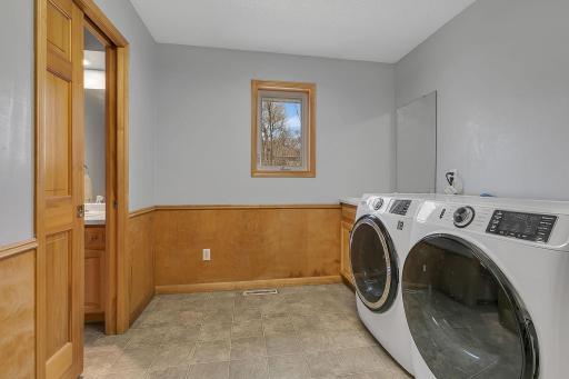 Main Floor Laundry and 1/2 Bath - New Washer and Dryer in 2025 - Conveniently Located off Garage Entry