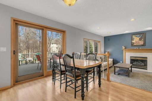 New Maintenance Free Deck is Easily Accessed Through Patio Doors, Providing Outdoor Entertaining Space