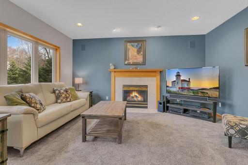 Great Room Overlooking Back Yard - Cozy Fireplace Warms the Space