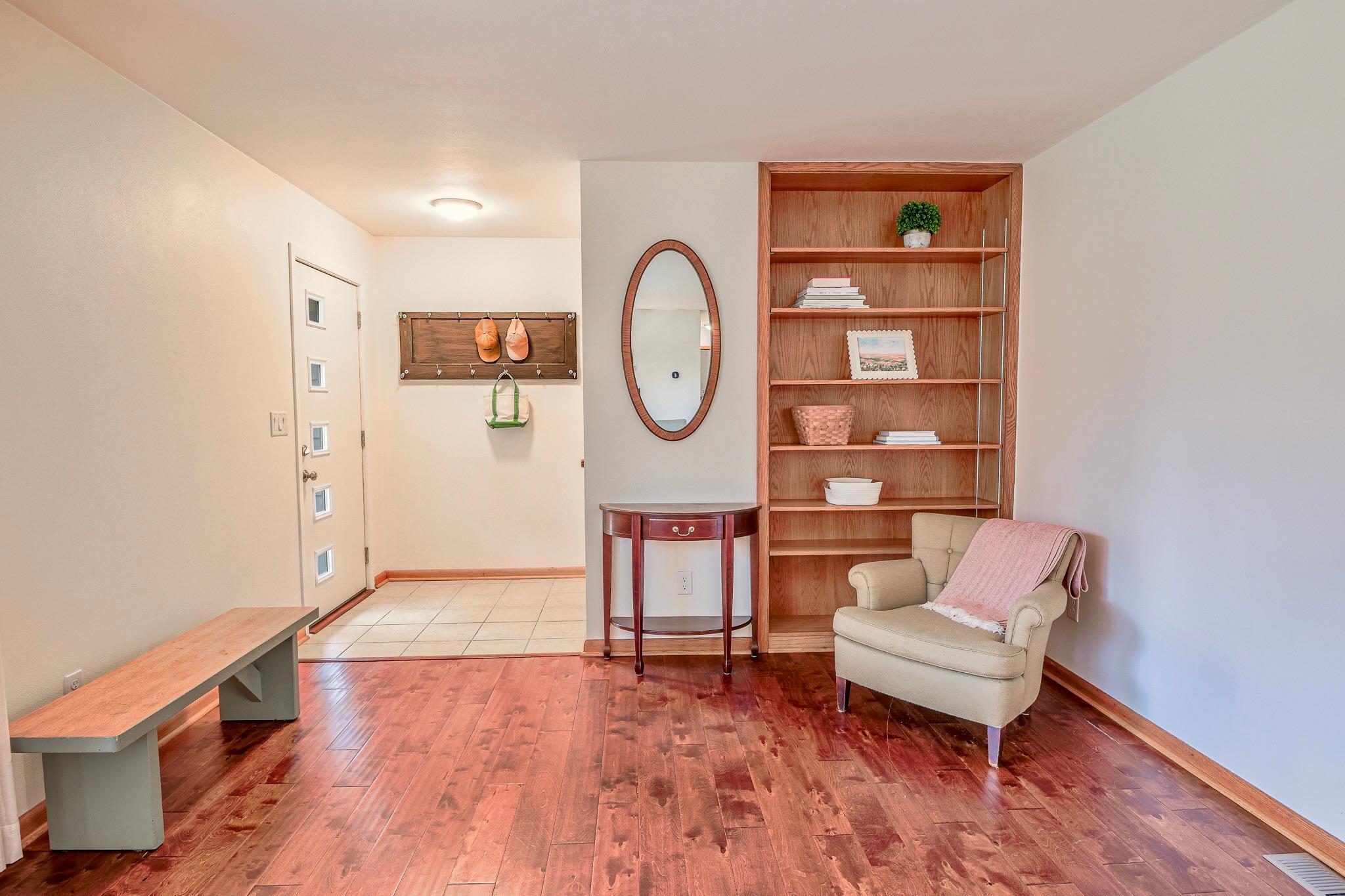 Enjoy the convenience of built-in shelving, perfect for books, décor, and everyday storage.