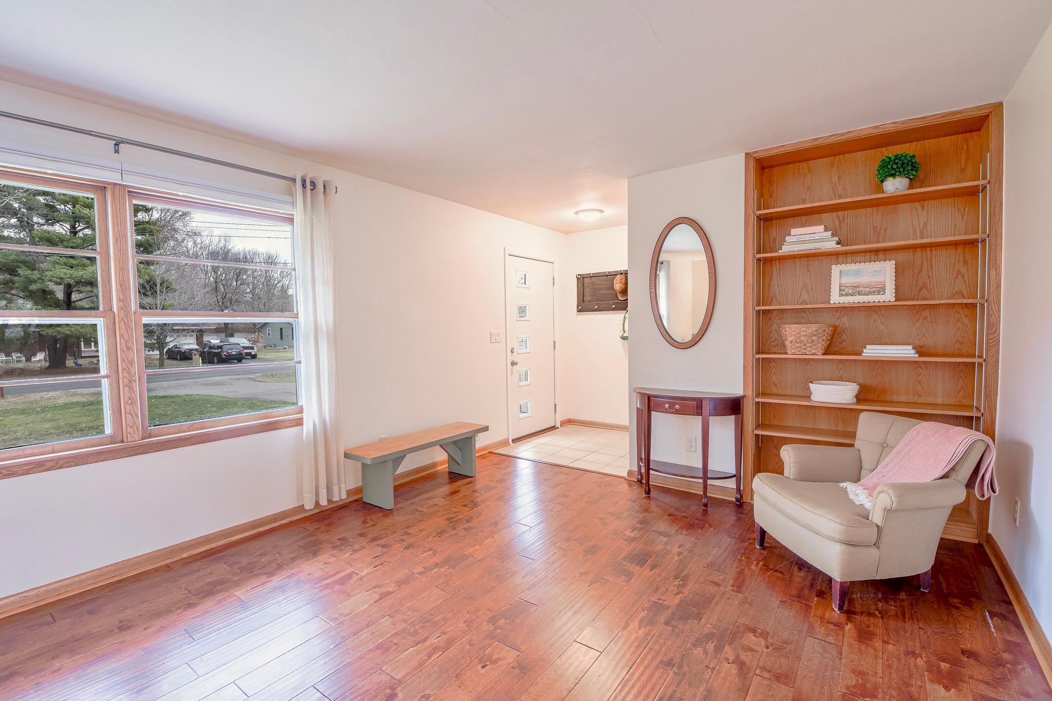 Upon entrance you are greeted by the front living room.