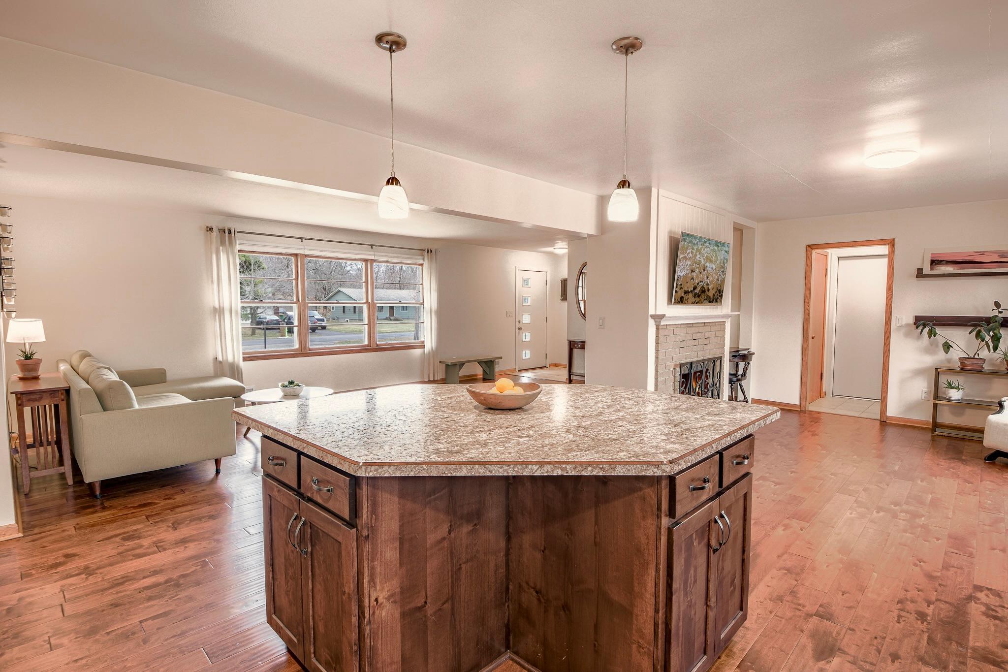 Generously sized center island offering extra workspace and storage.