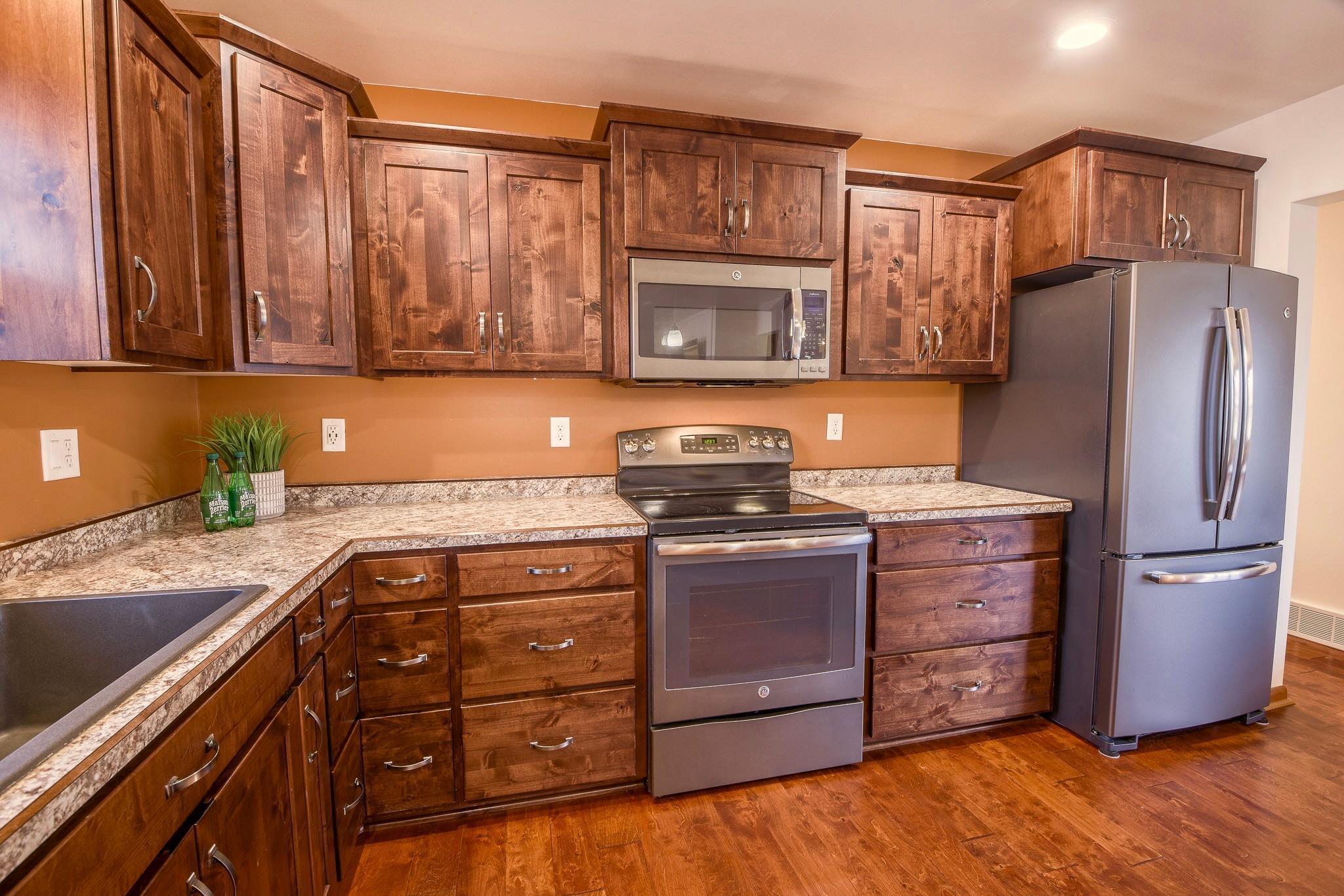 Ample cabinetry for all your culinary needs and stainless steel appliances throughout.