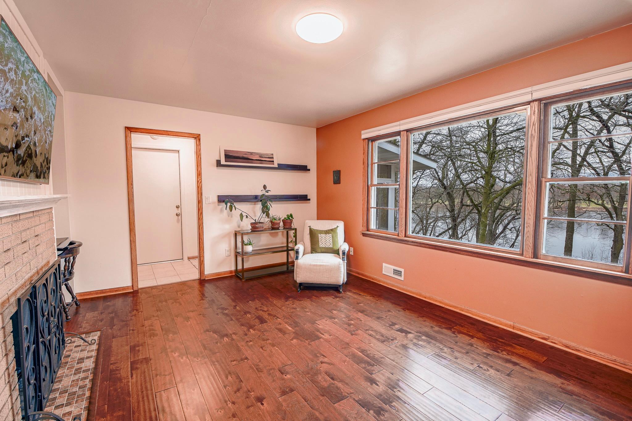 Lends access to the garage and screened in back porch.