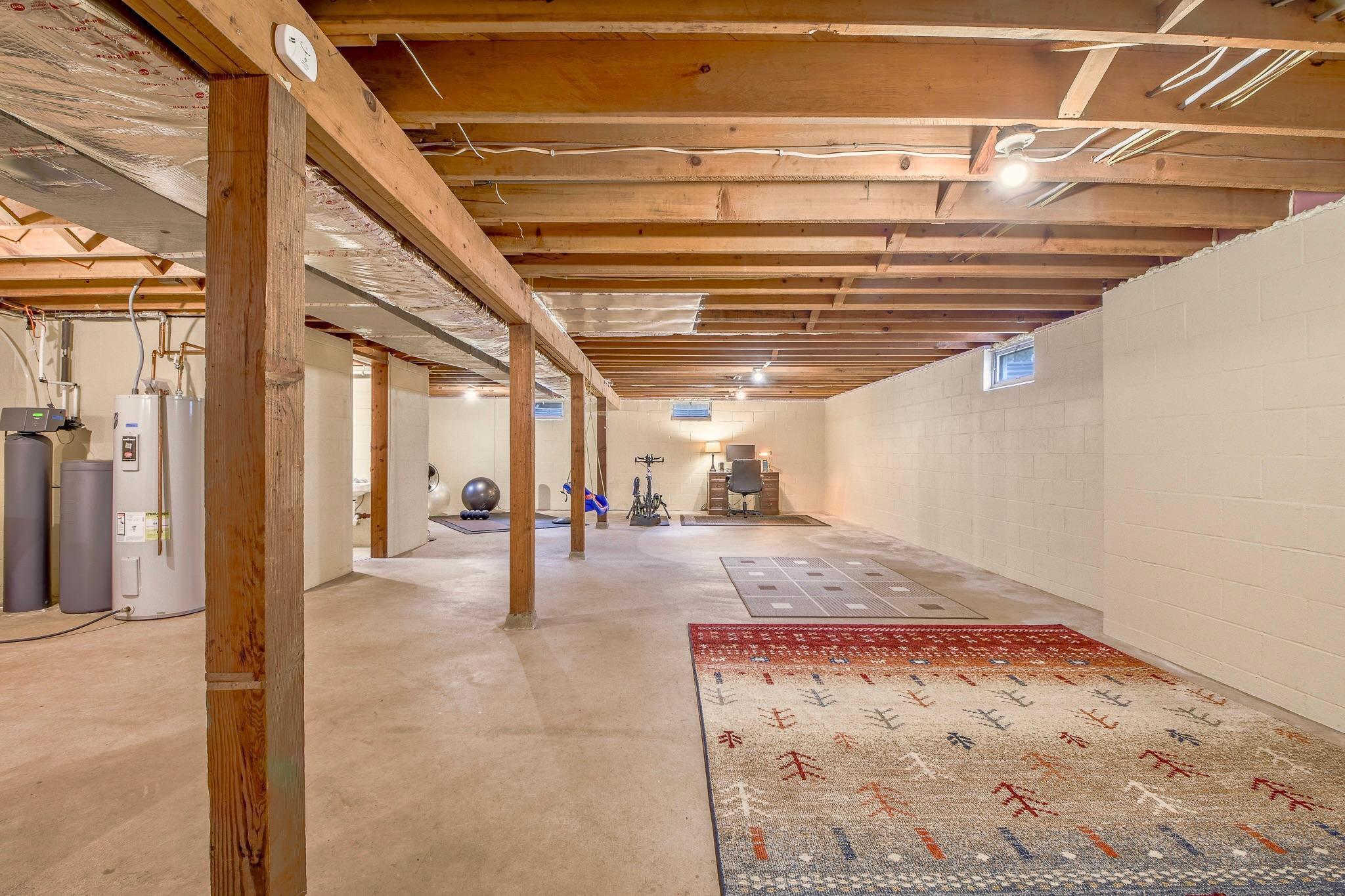 Unfinished lower level offers plenty of potential for customization.