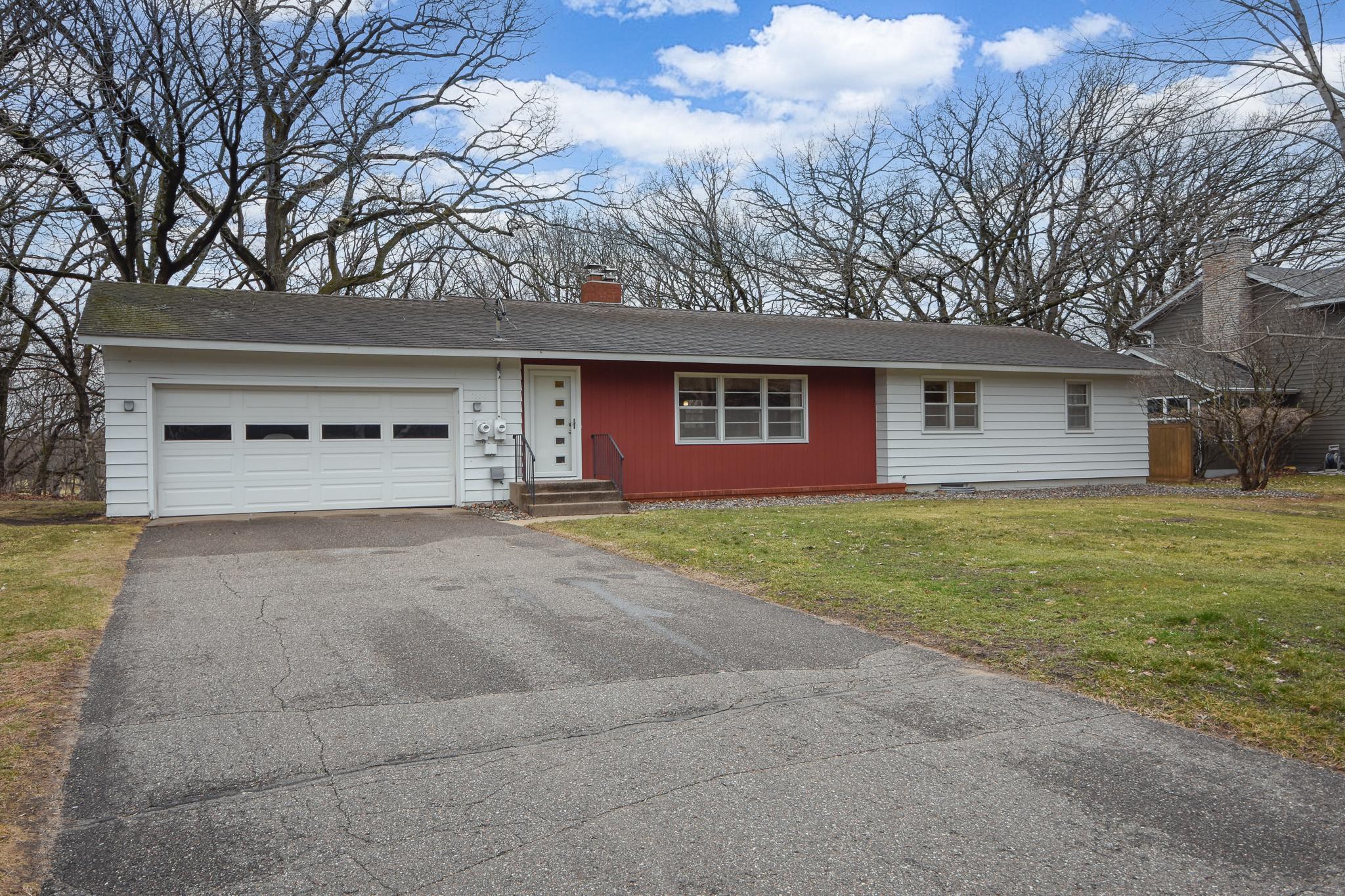 2 stall garage with driveway space to accommodate multiple vehicles.