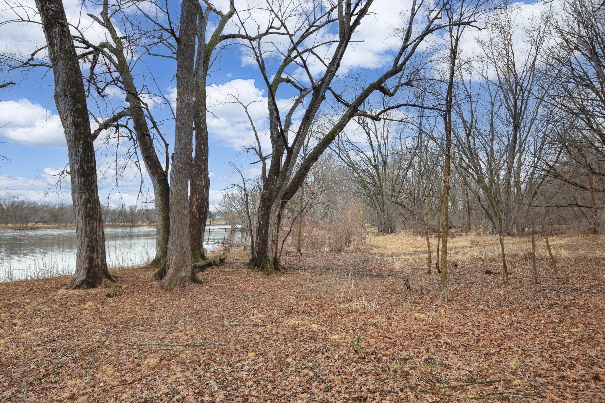 Trees shade the yard during the hot months.