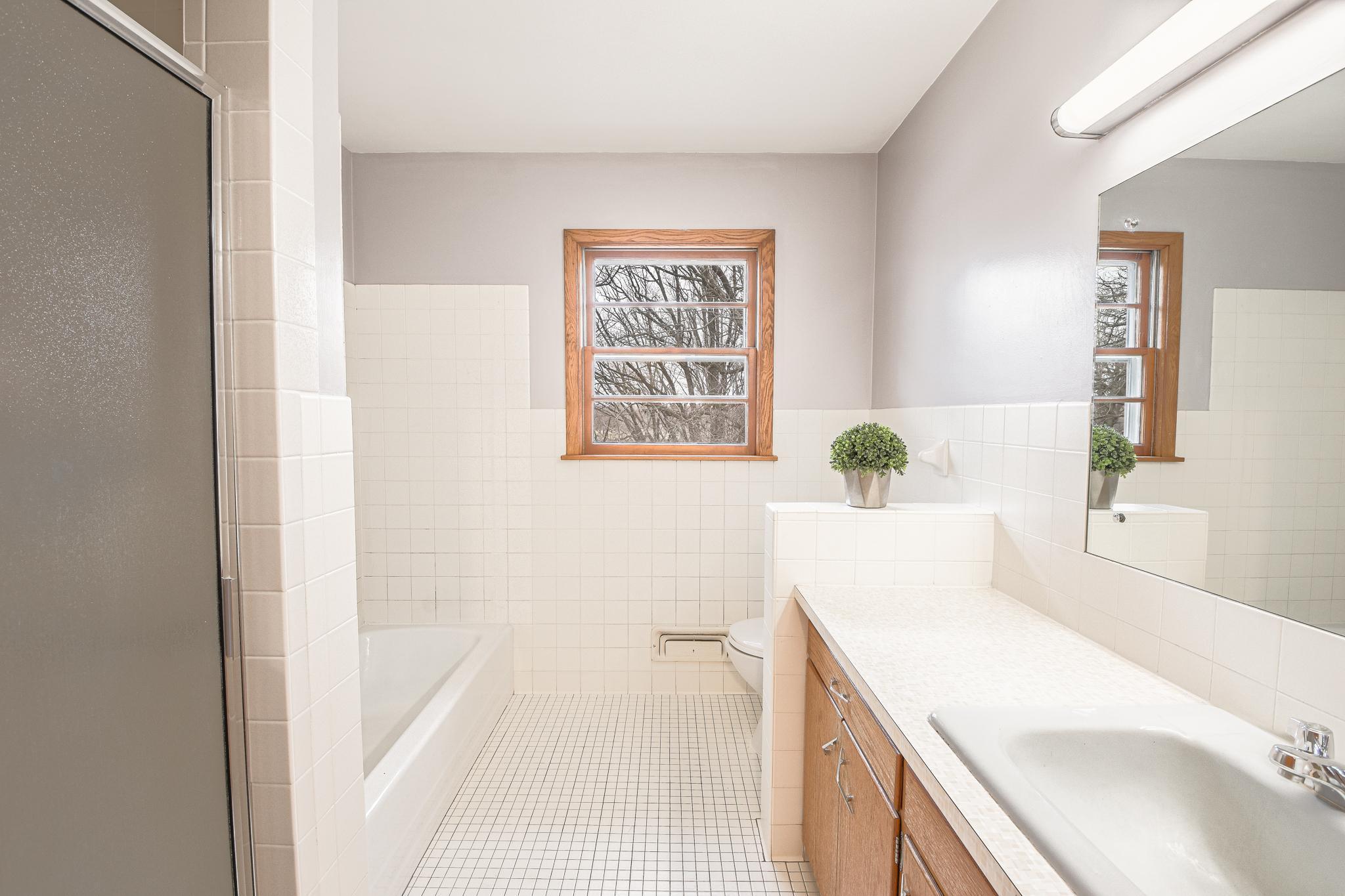 Separate tub and shower.