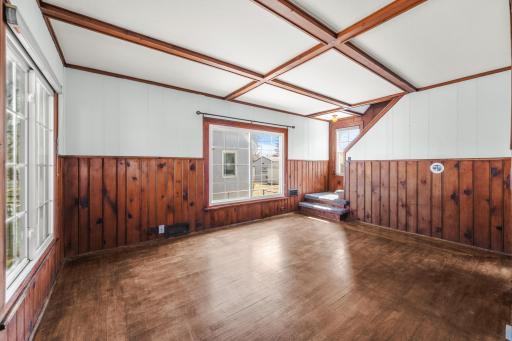 Once inside you're greeted with beautiful woodwork throughout the main level.