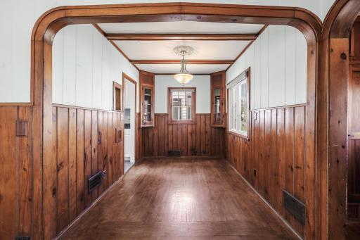 The formal dining room connects the kitchen and living spaces.