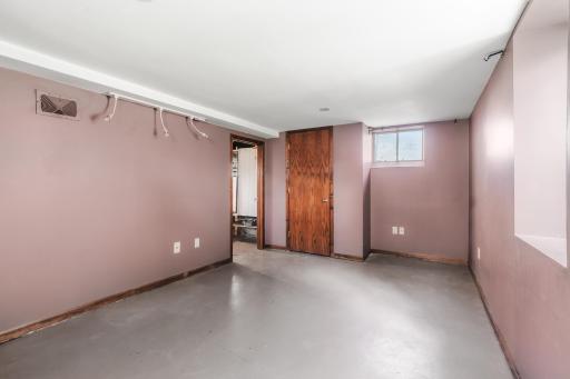 Lower level bedroom has an egress window (not shown), or could be used as an additional family room.