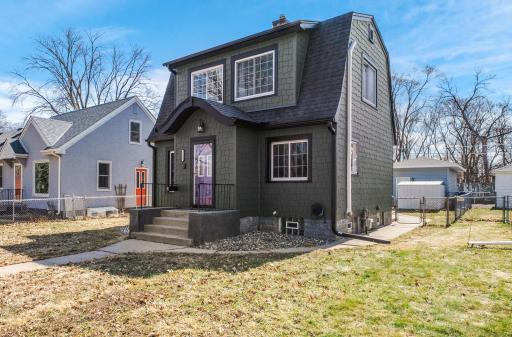 A charming Dutch Colonial with all new Hardie Board shake siding (2023).