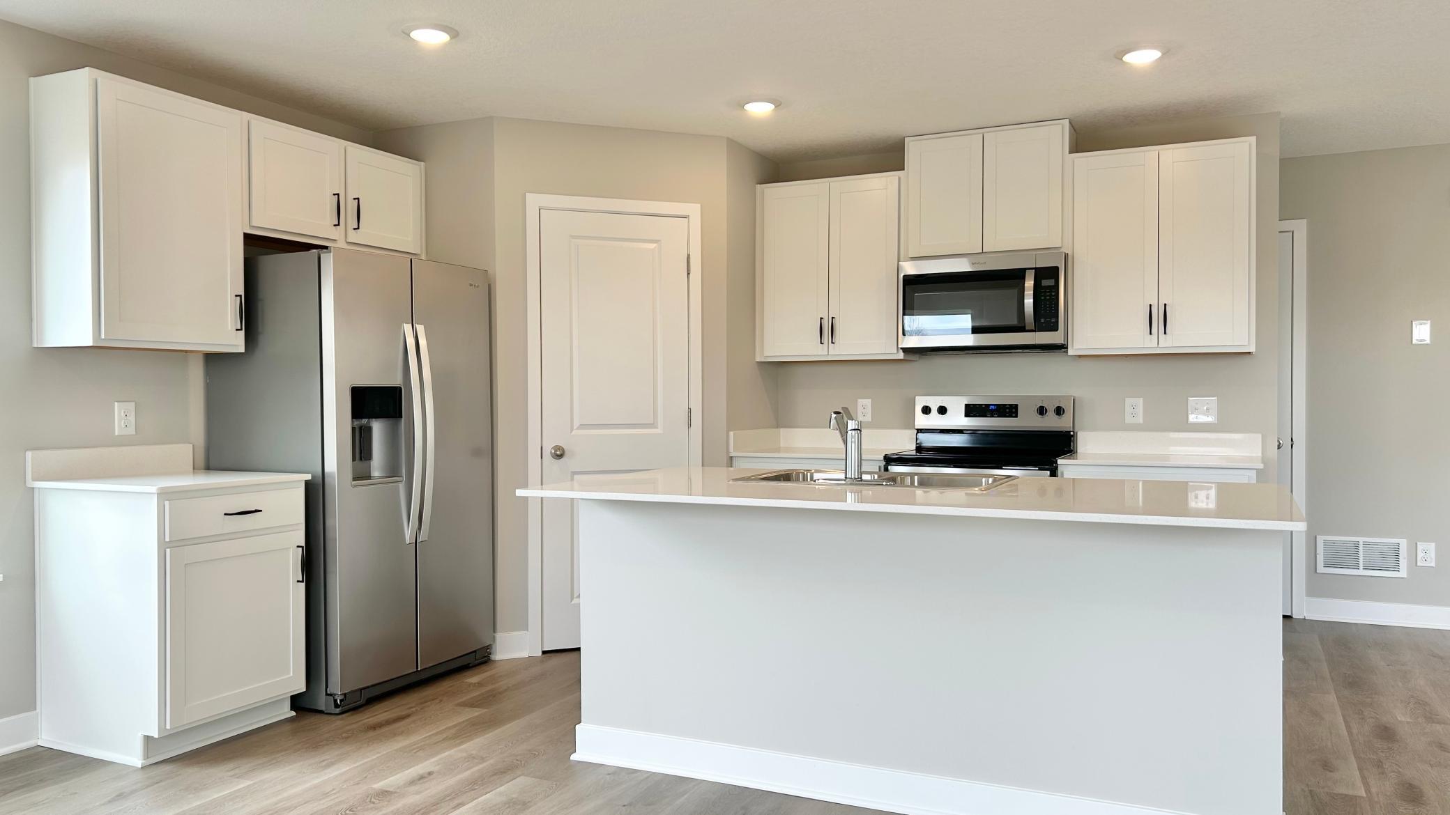 Stainless steel appliances! Electric range and microwave, vented to the outside + more!