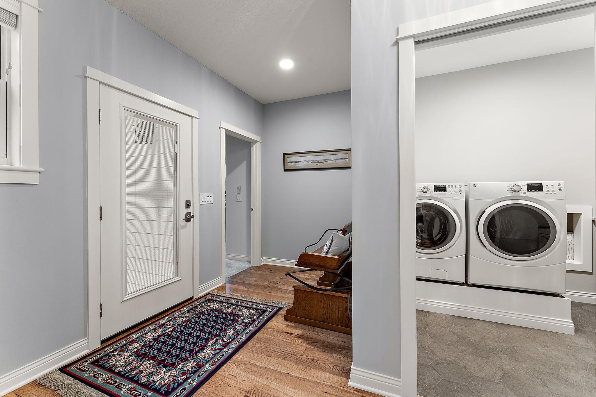 Laundry room off the main floor hallway to primary suite!