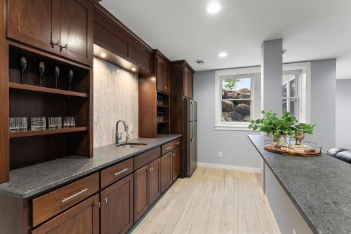 Full wet bar with leather granite countertops!