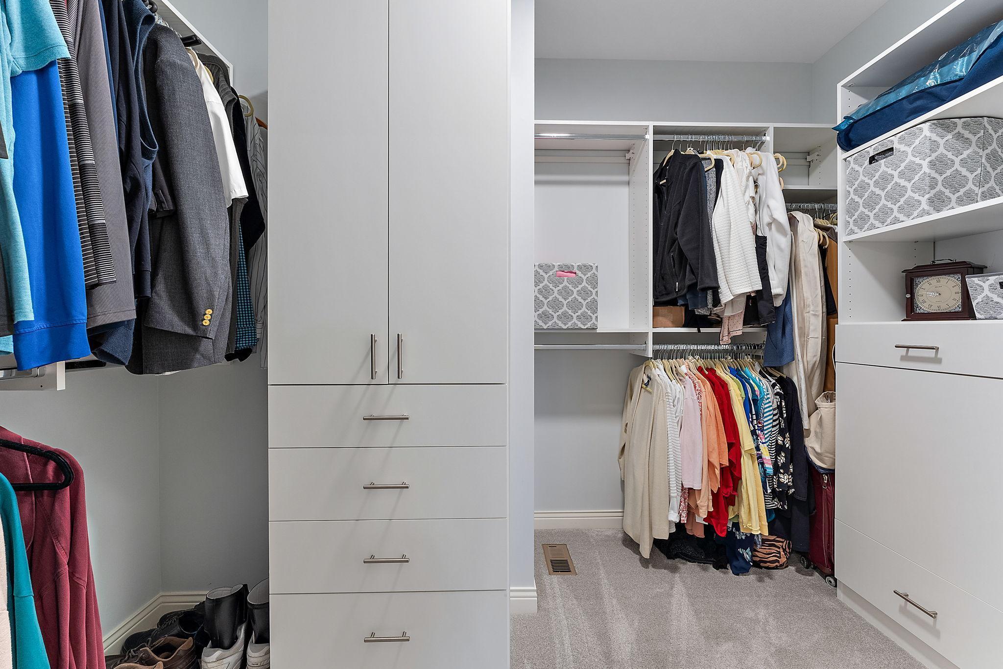 Primary ensuite walk in closet.