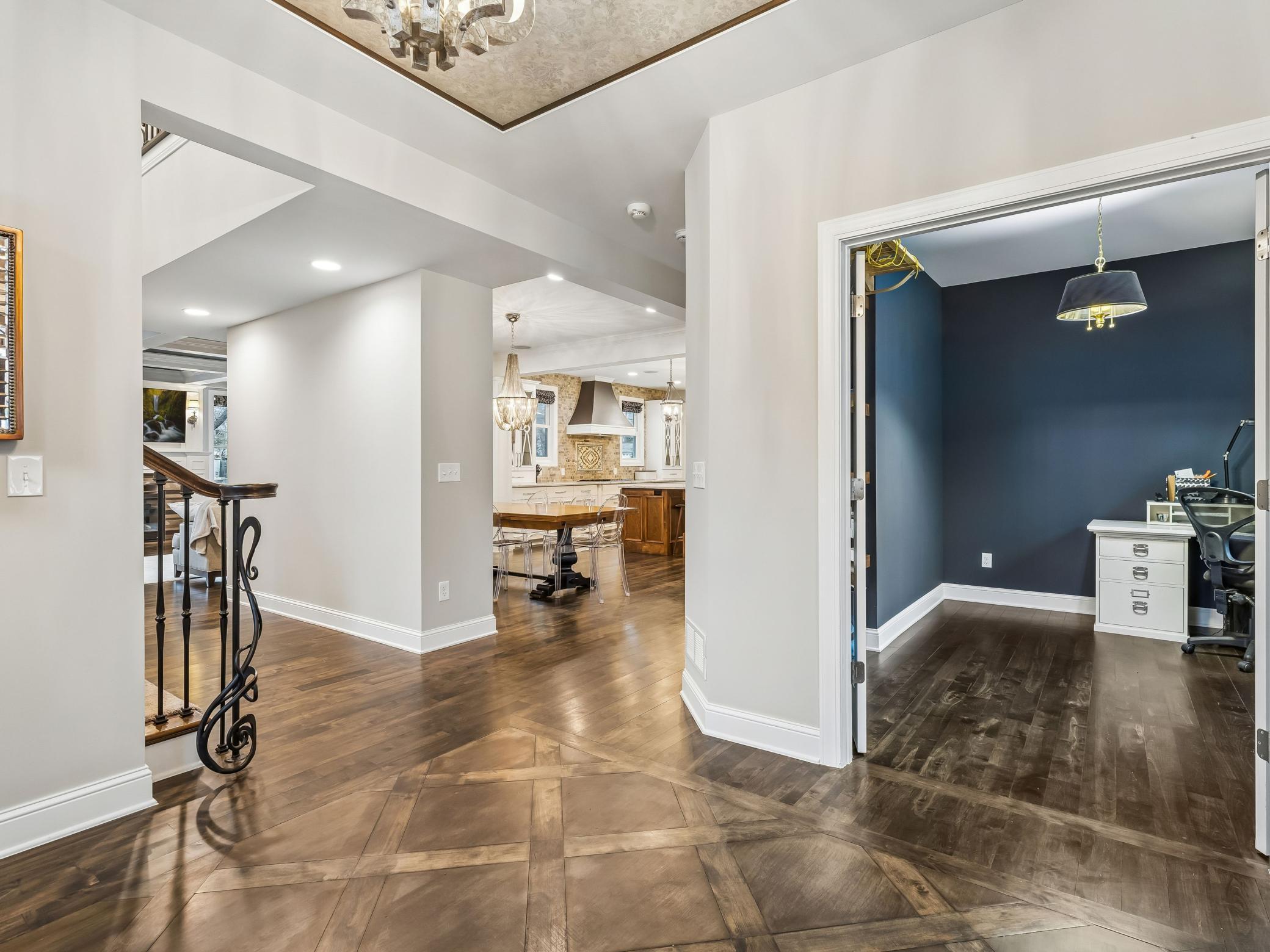Large open foyer, door to the right leads to office