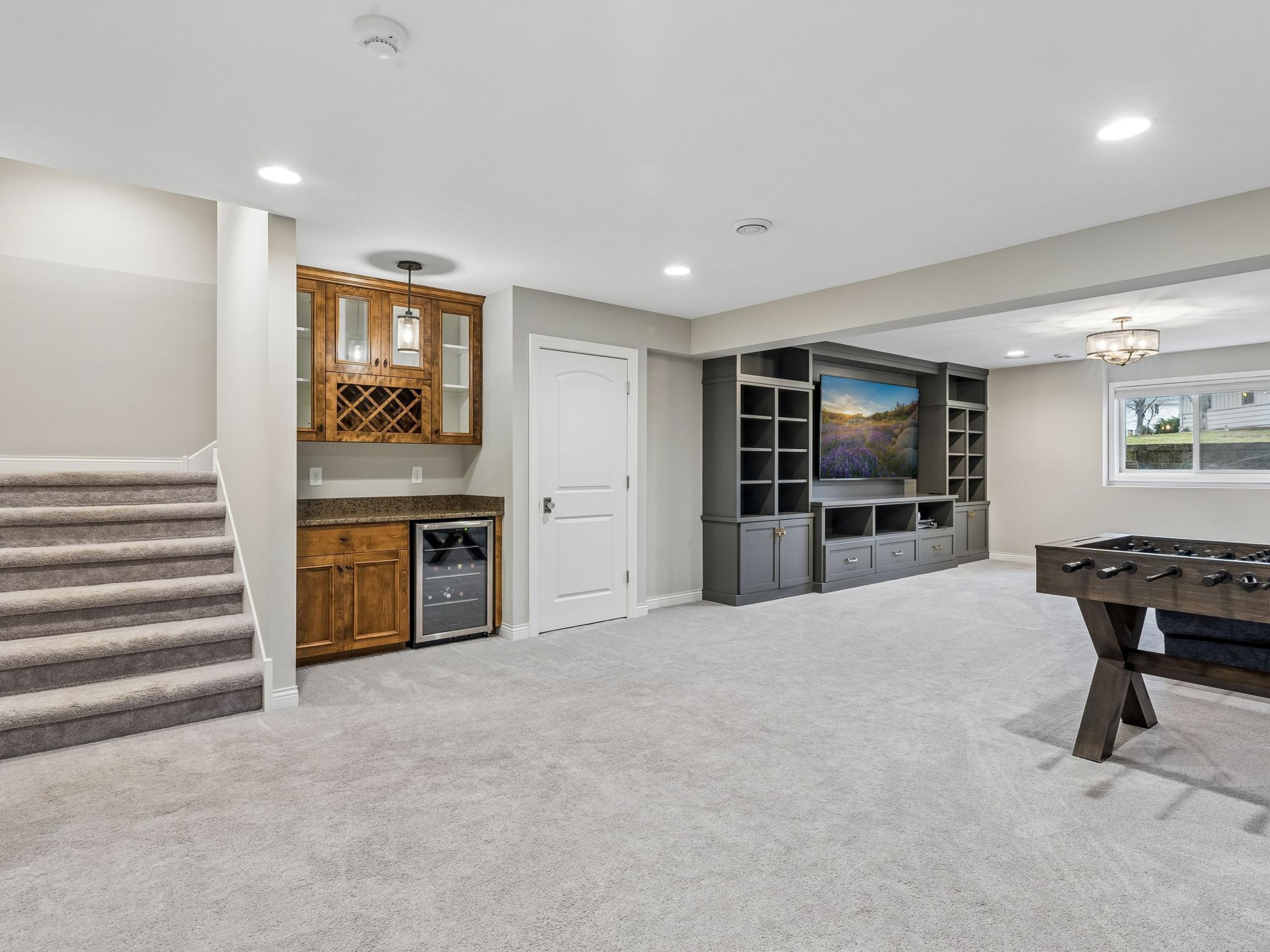 Lower level with dry bar, game room and family room