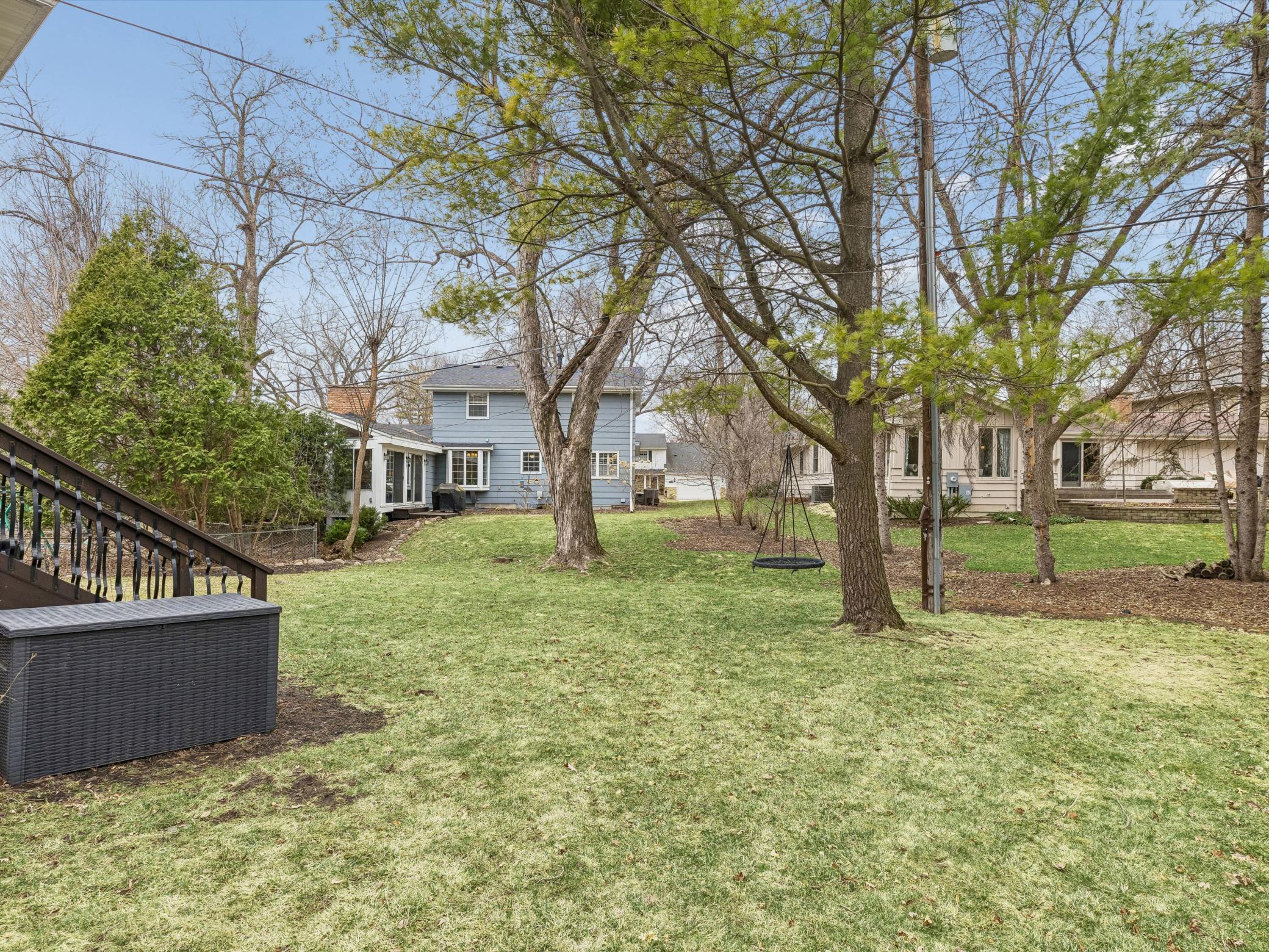 Open backyard with mature trees