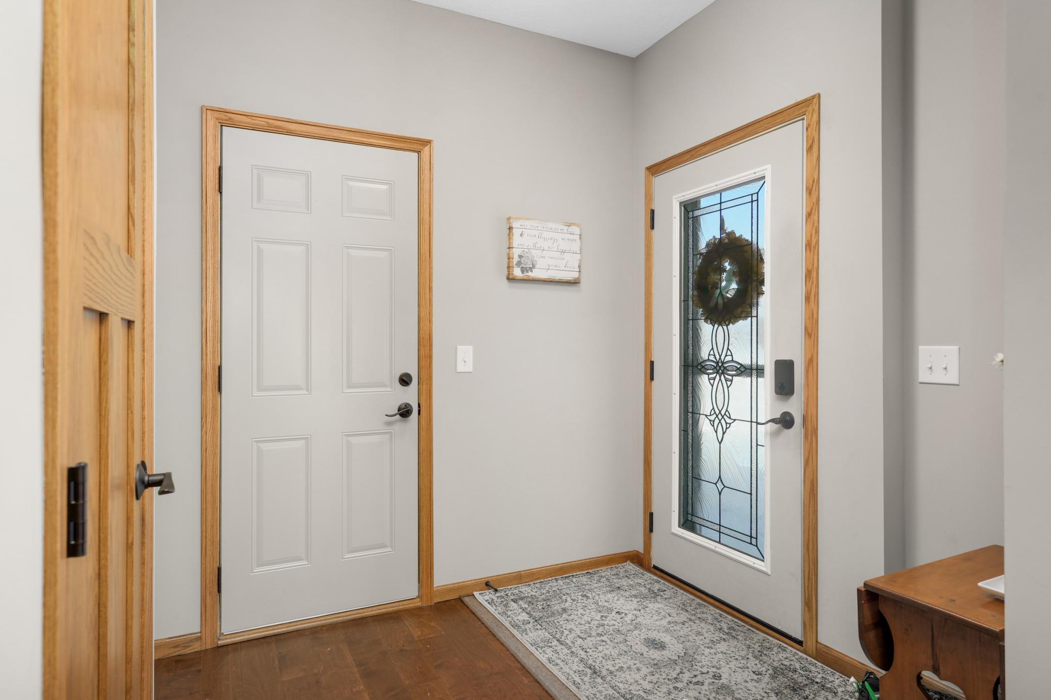 Front door entryway/access to garage